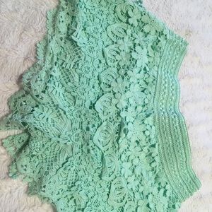 Mint green shorts. Worn little size 7/9